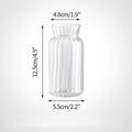 Clear glass vase with measurements.