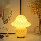 Yellow mushroom lamp with striped design for home decor.